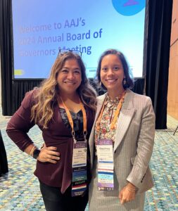 Courtney Winston (pictured right) now serves on the board of governors for the Minority Caucus