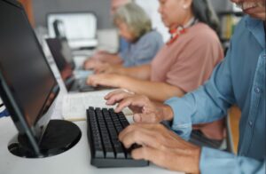 seniors practicing computer literacy 