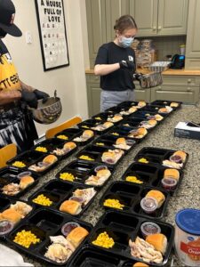 Allen & Allen cooks meal for families in need at the Ronald McDonald House