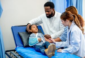 hurt child in hospital bed