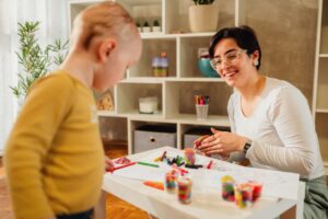 child with cancer doing crafts